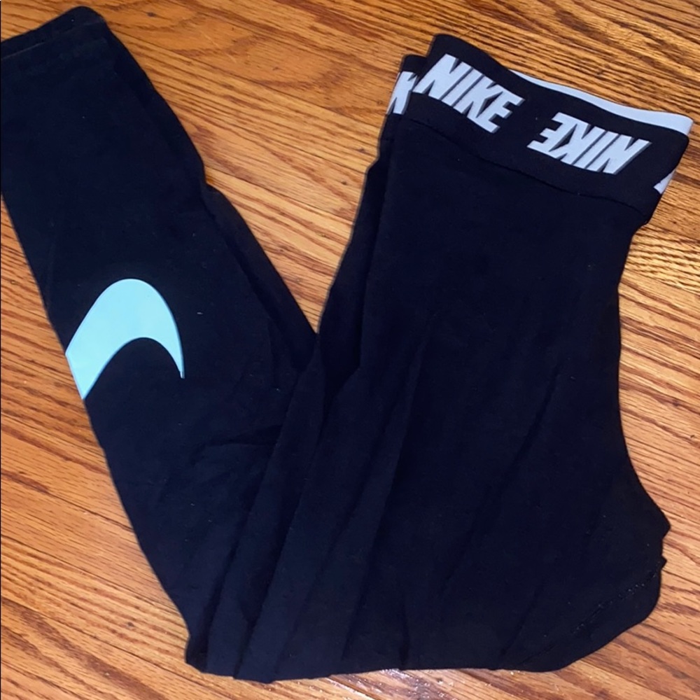 Nike leggings with light blue swoosh